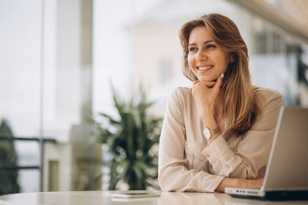 Portrait Of A Business Woman Working On Laptop